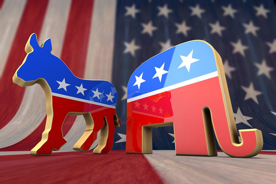 Democrat+Party+and+Republican+Party+Symbol+on+an+American+Flag+Background