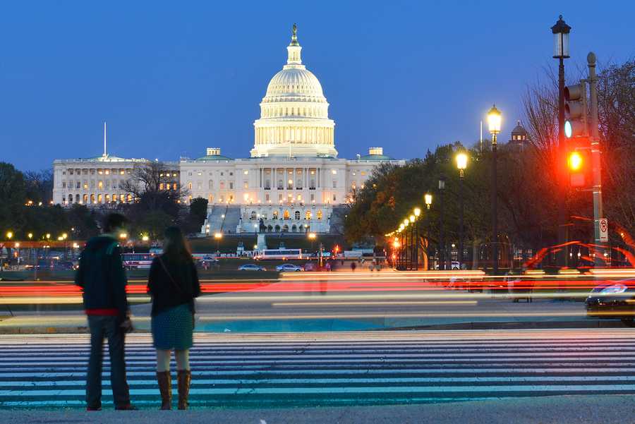 Washington+DC+-+US+Capitol+Building+with+car+lights+trails+foreground+at+night