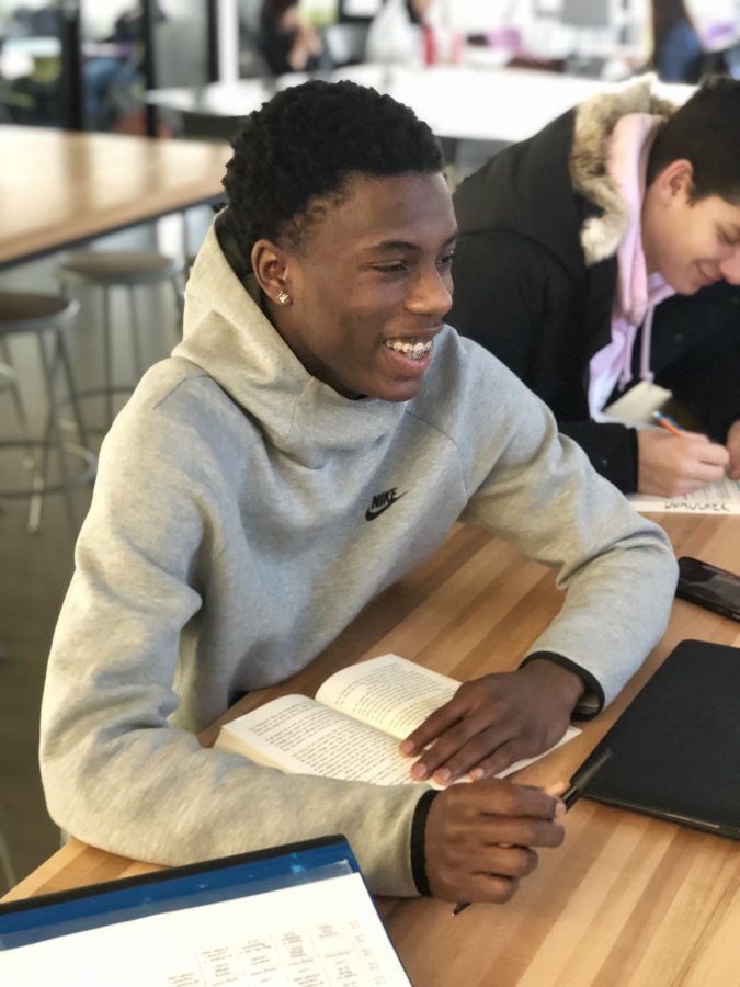 Kyrell Luc ’21 working on his English III annotations. Photo By Gianni Thompson ’21.