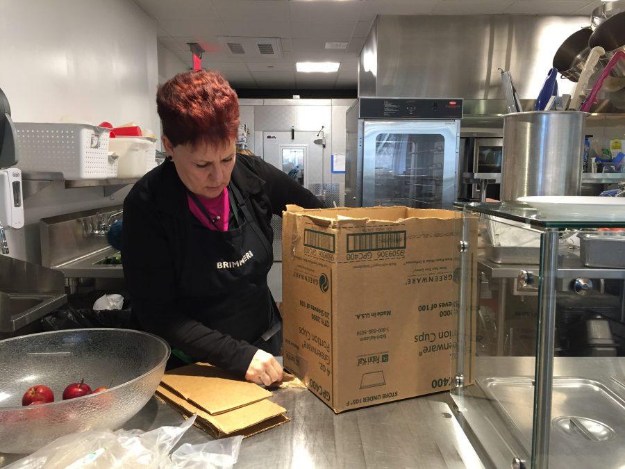 Debbie O'Malley  hard at work with inventory. Photo by Caroline Champa '20.