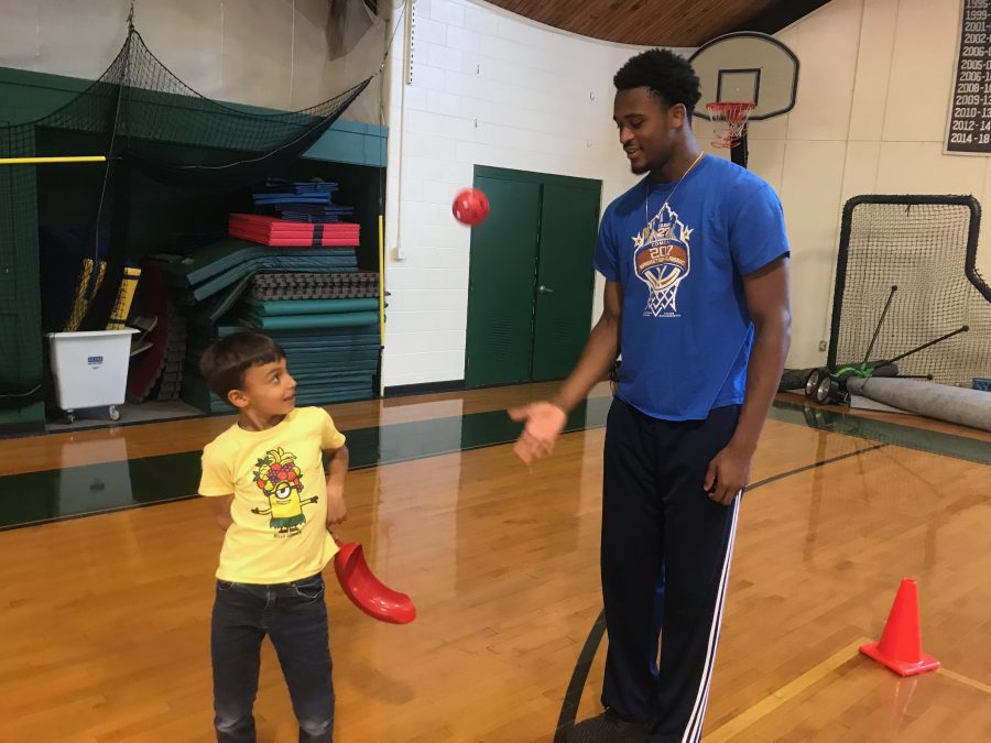 Jordan Minor 19 interned with Athletic Director Jeff Gates for his Senior Project, helping in a Lower School gym class. 