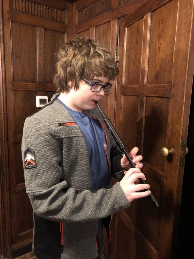 Michael Young '23 plays the practice chanter. 