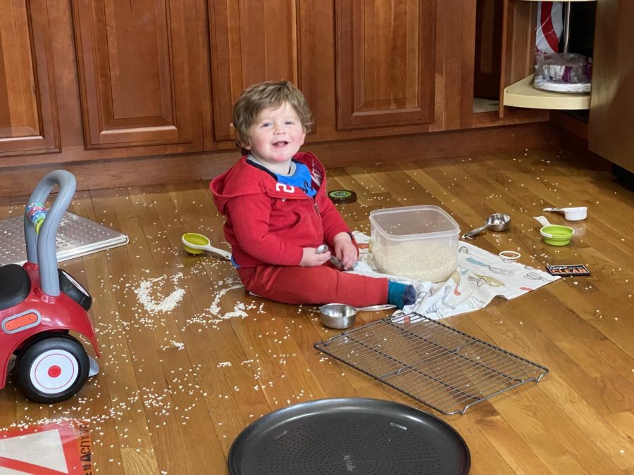 History teacher David Cutlers young son makes a mess in the kitchen while dad and mom, also a teacher, Zoom with students. The picture speaks for itself. 