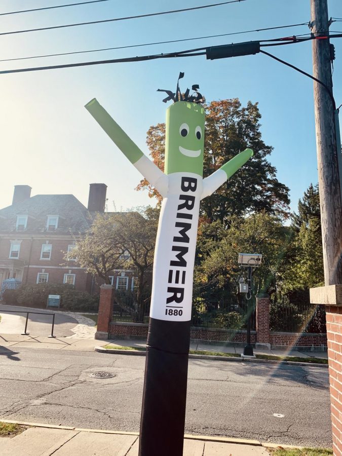 An inflatable Brimmer-themed decoration waves before Opening Convocation.