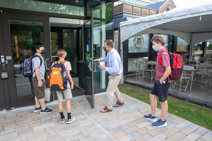 Director of Enrollment Brian Beale welcomes students to school on Opening Day earlier this year.