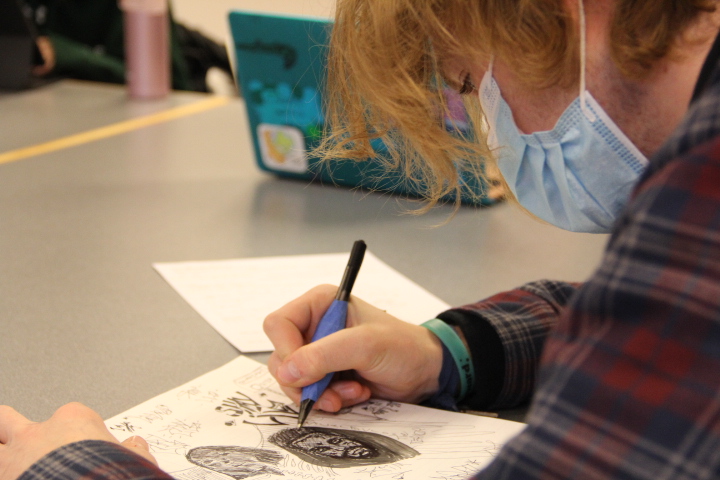 Photo illustration of a student doodling during class, which some teachers allow but some ban. 