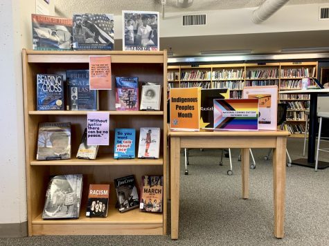 In the Middle and Upper School Library here, books about social justice issues are shown on display.