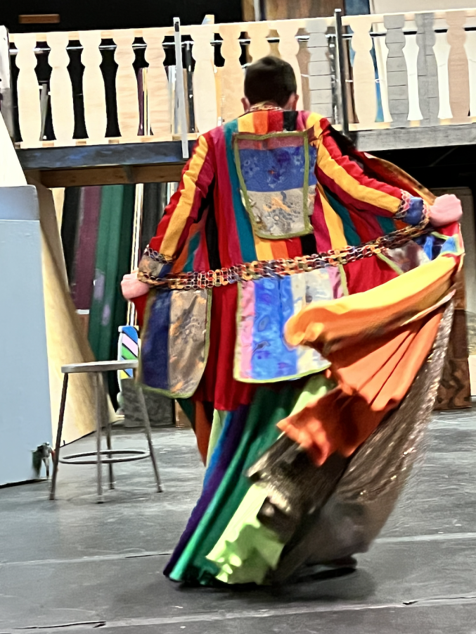 Daniel Murray 23, who plays Joseph, shows off his costume for the production.