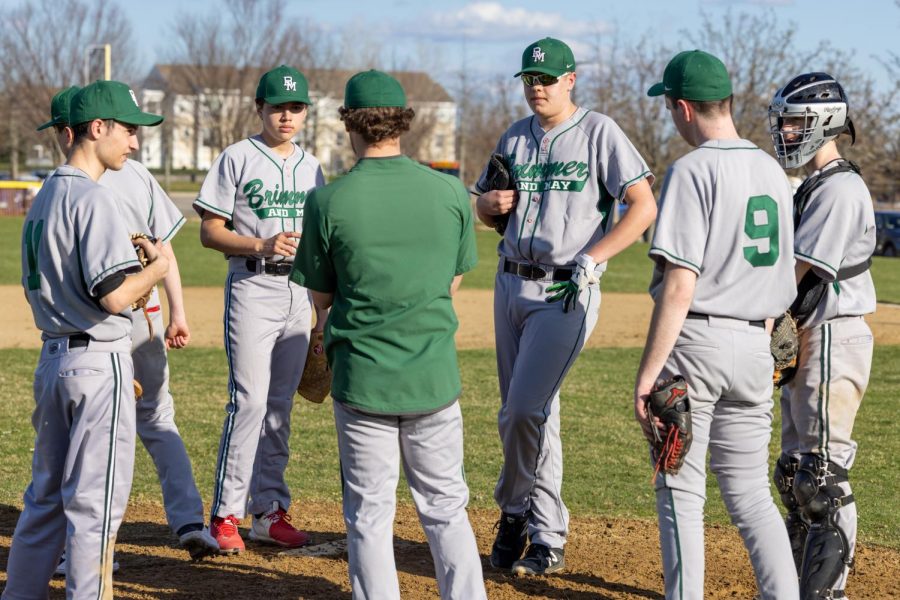 The team huddles before the game.