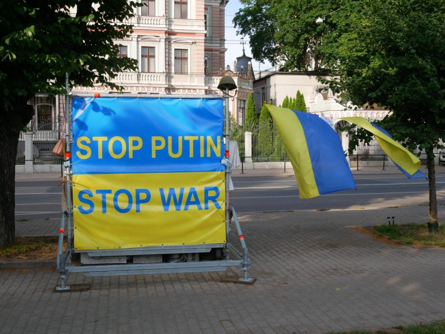 Protesters placed anti-war signs along a street in Latvia. Photo courtesy of Wikimedia Commons.