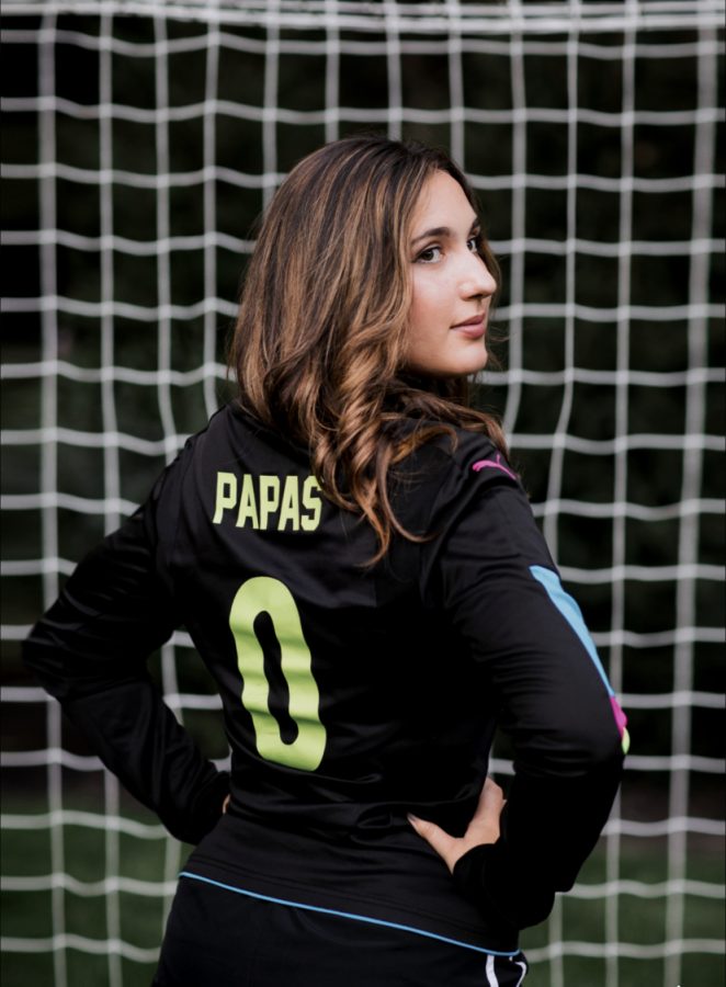 Papas+sports+signature+jersey+in+front+of+net.+Photo+provided+by+Papas.