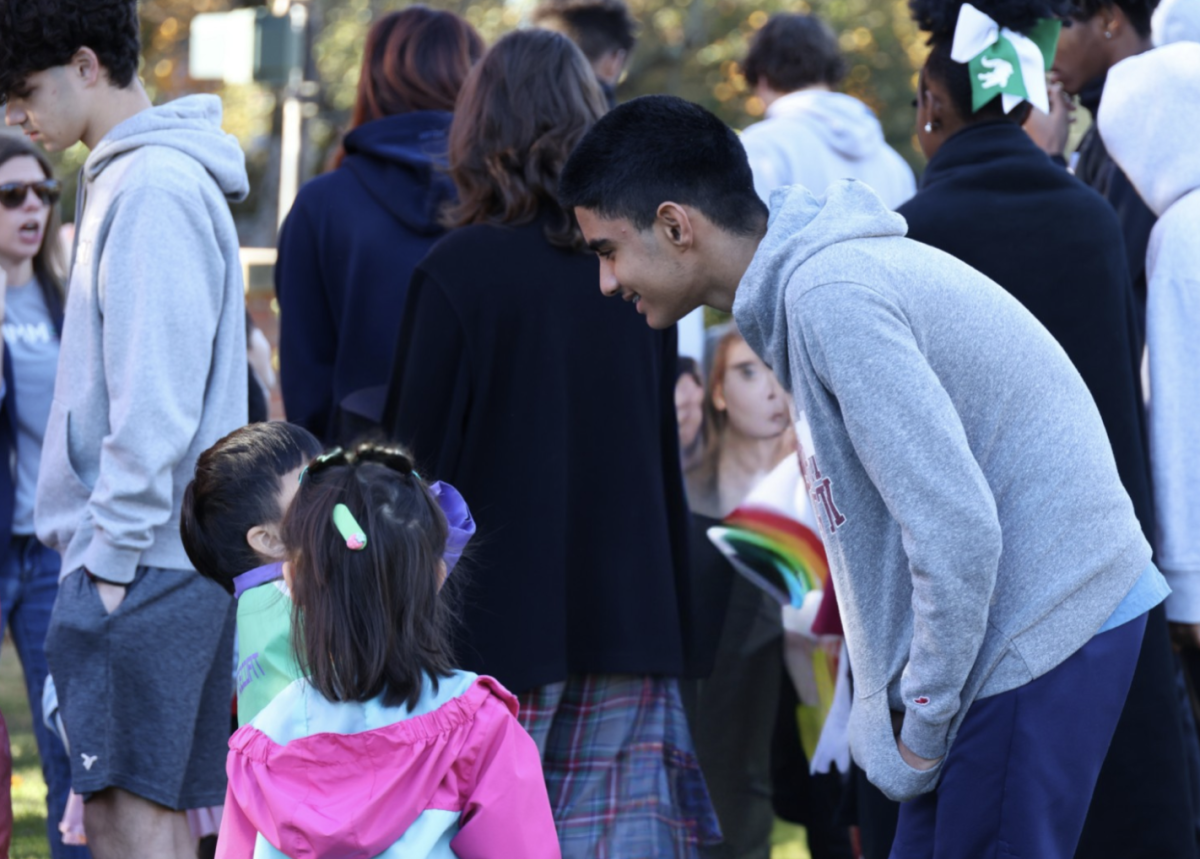 Rohan Muni '28 engages with Lower School students during last year's Harvest Fest. 
