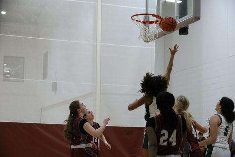 Kaylee Little 23 makes a layup.