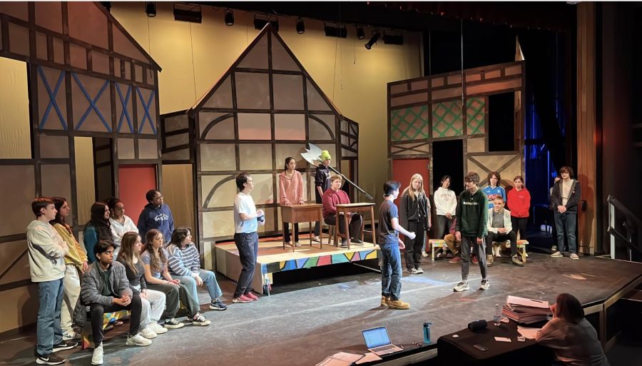 Actors rehearse a scene for the musical. Photo by Bill Jacob. 