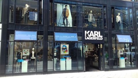 Karl Lagerfields designs on display by the windows of a Berlin shop. Photo Courtesy of Wikimedia Commons. 