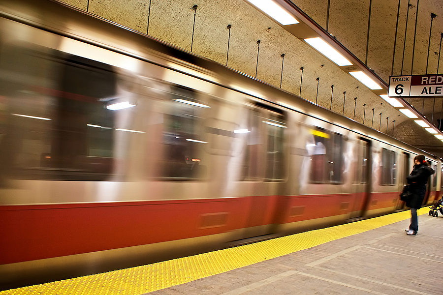 A person waits for the MBTA Red Line. 