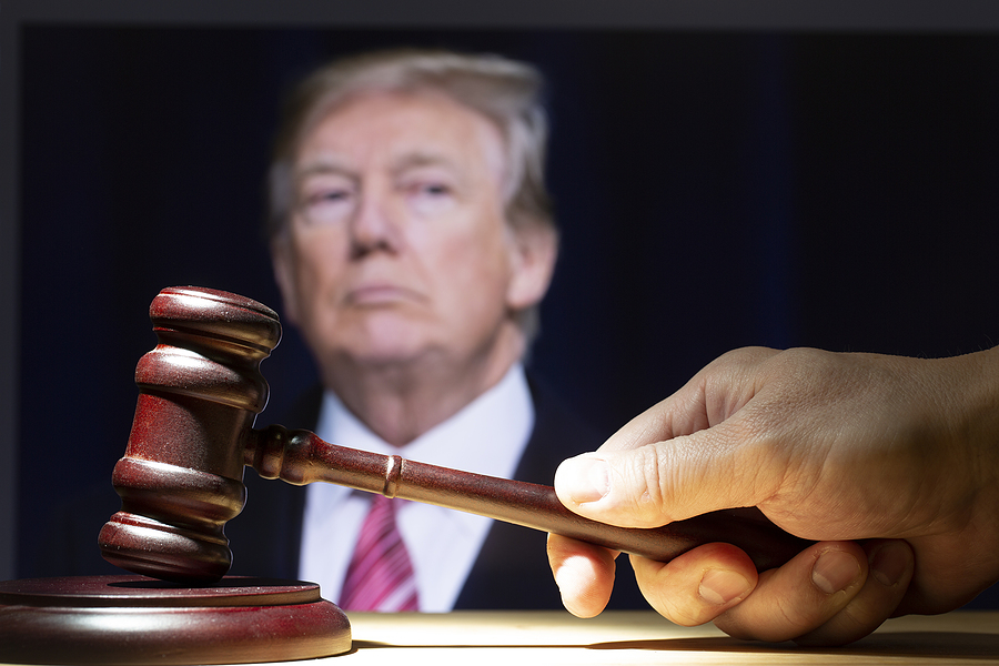 The+judicial+hammer+on+the+background+of+Trump.