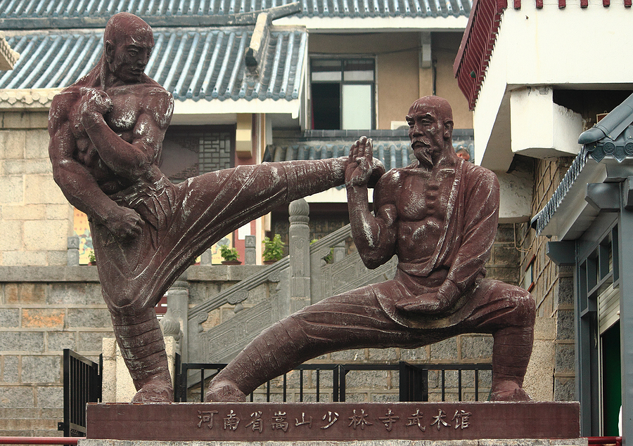 Statue of two fighters near Shaolin temple, China