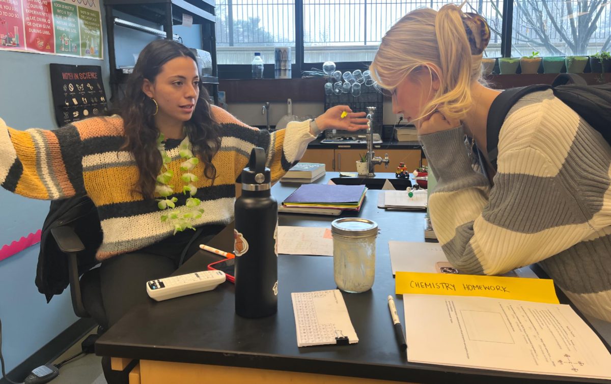 Science teacher Zoë Stublarec works one-on-one with chemistry student Stephanie Altschul 25. Ms. Z always helps me to understand content that Ive missed in class. She knows all of her students, and is really able to personalize the learning experience.