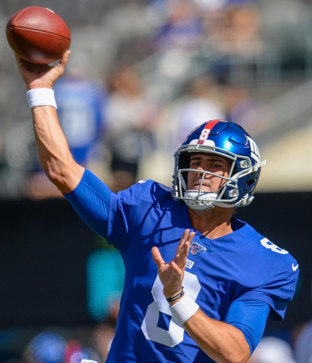 New York Giants quarterback Daniel Jones throws a pass to one of his receivers. After a breakout season last year, Jones's season ended abruptly with a torn ACL. 