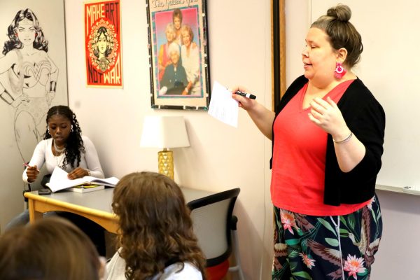 English teacher Kenley Smith gives some final pointers before students in Villains class take an in-class essay Watchmen, by Alan Moore and Dave Gibbons. 