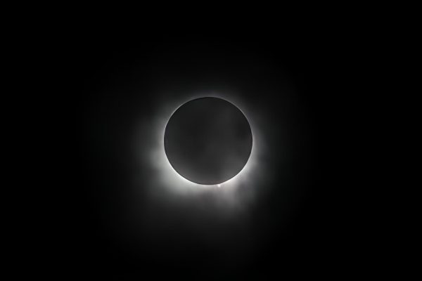 The moon passes by the sun in northern Vermont, where a group of Upper Schoolers watched the solar eclipse at totality. Totality lasted two minutes in Vermont, while students saw a near-total eclipse at School.