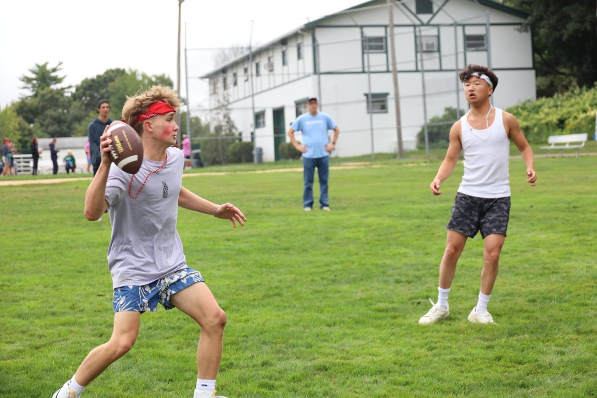 Ryan Hurst '25 throws the ball to Huck Jennings '25 during touch football. 