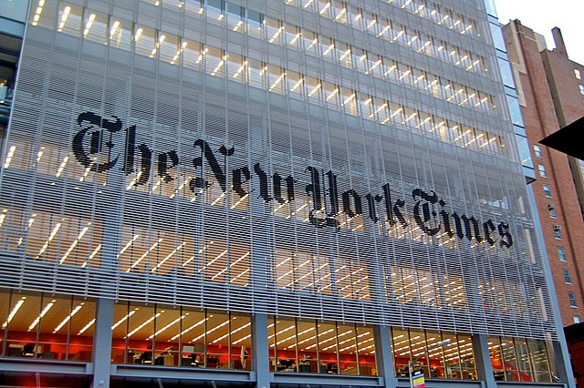 The New York Times building in New York, NY across from the Port Authority. 