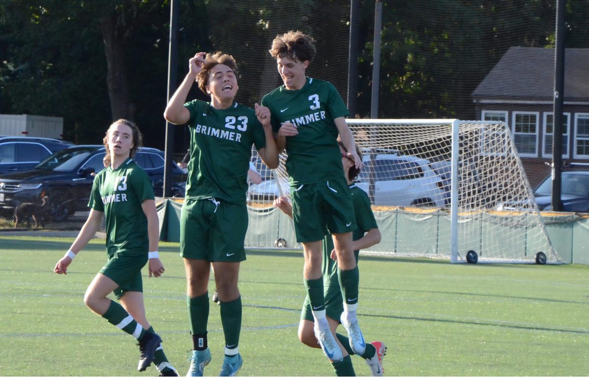 Will Apen ’25, Ryan Hurst ’25, and Jonathan Walsh ’25 celebrate a goal.
