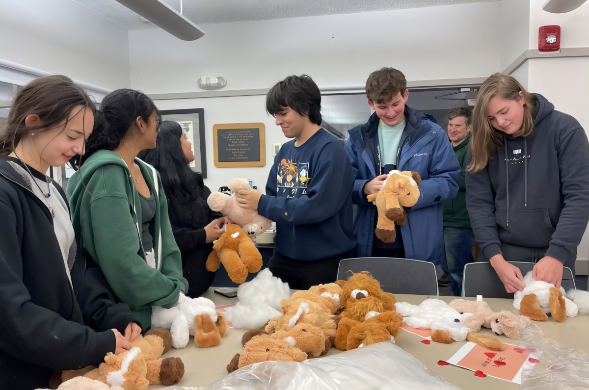 Students from the Class of 2023 engage in the inaugural destress fest, making stuffed lions. 