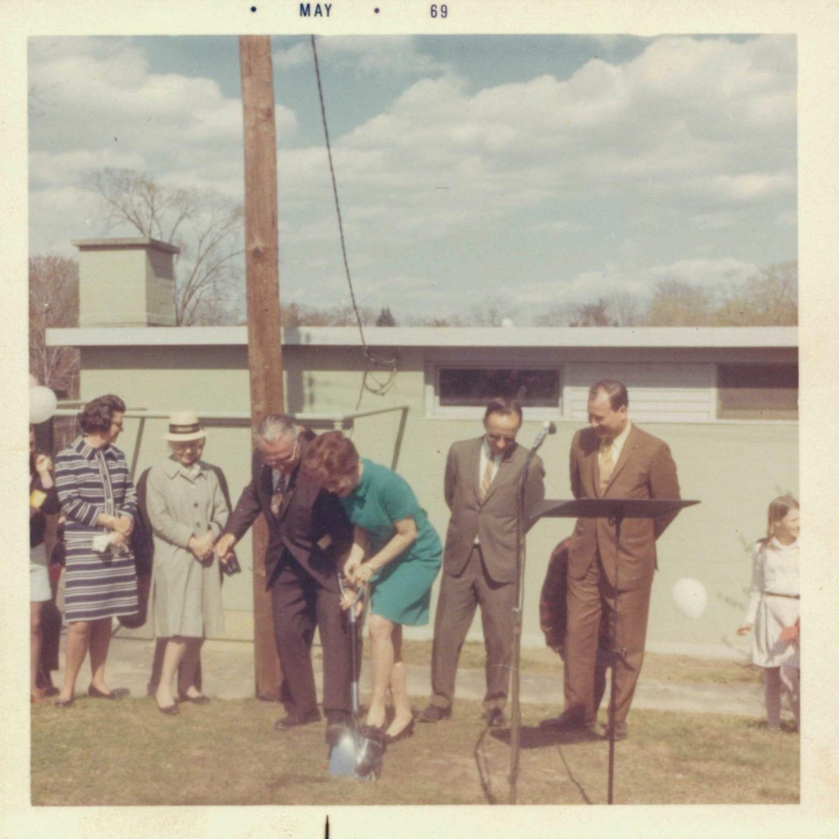 Former Head of School Emily C. Thompson breaks ground from the Gym, which is due to be demolished March 10. 