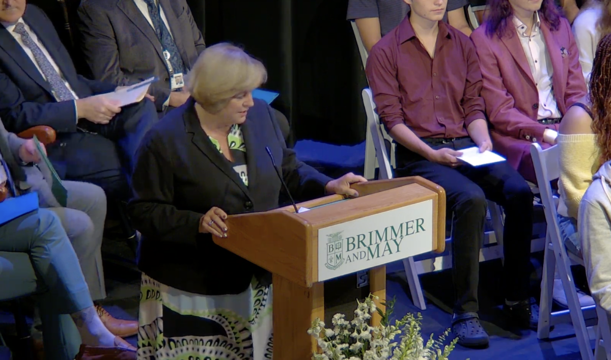 Head of School Judith Guild addresses the Middle and Upper Schools for the official opening of the academic year. 