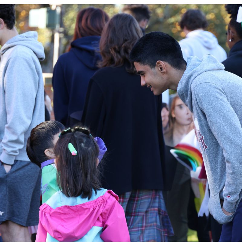 Rohan Muni '28 engages with Lower School students during last year's Harvest Fest. 