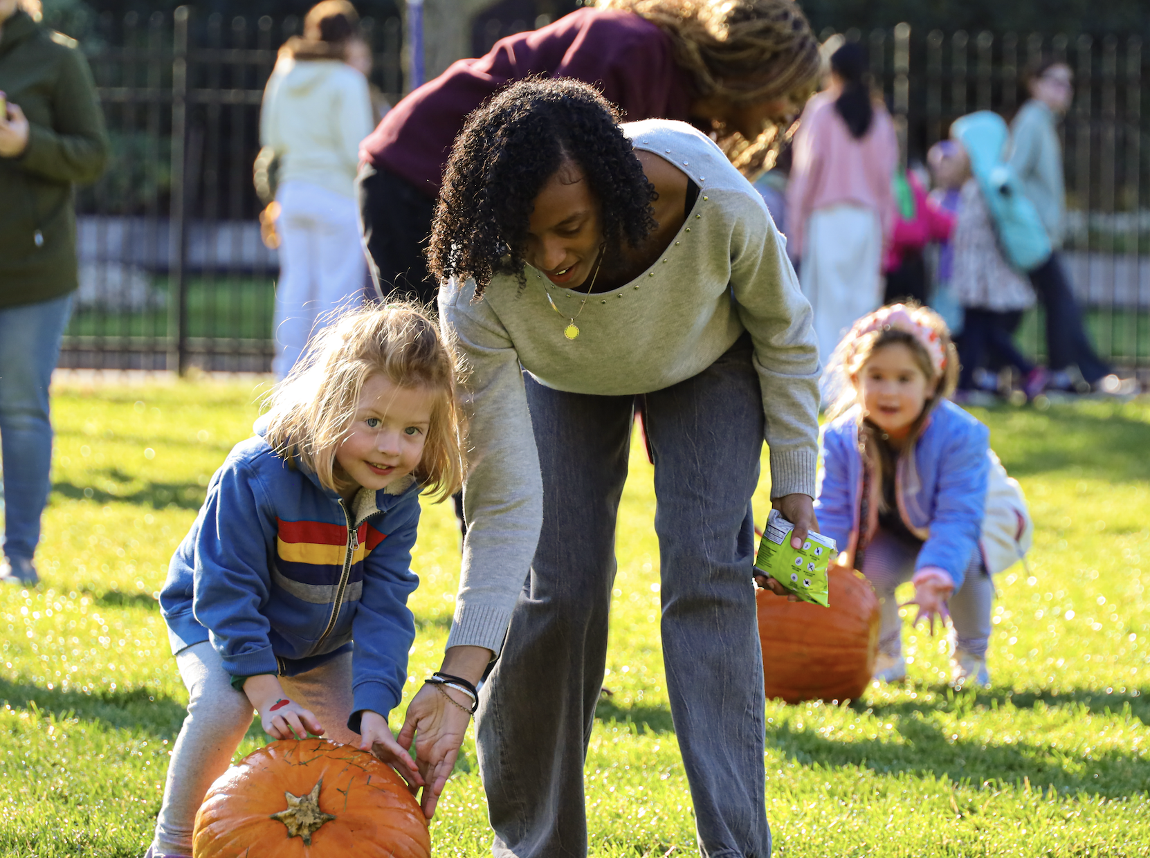 Lower, Middle, and Upper School students came together on the field today for Harvest Fest, enjoying an hour of fun with live music from Gator Scales, cider donuts, drinks, pumpkin rolling, limbo, and plenty of time to relax and hang out.