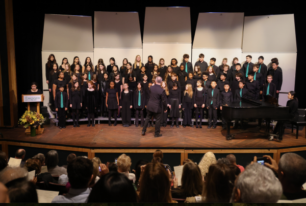 May Chorale performs during last year's Thanksgiving and Special Friend's Assembly, in front of a packed theater. 