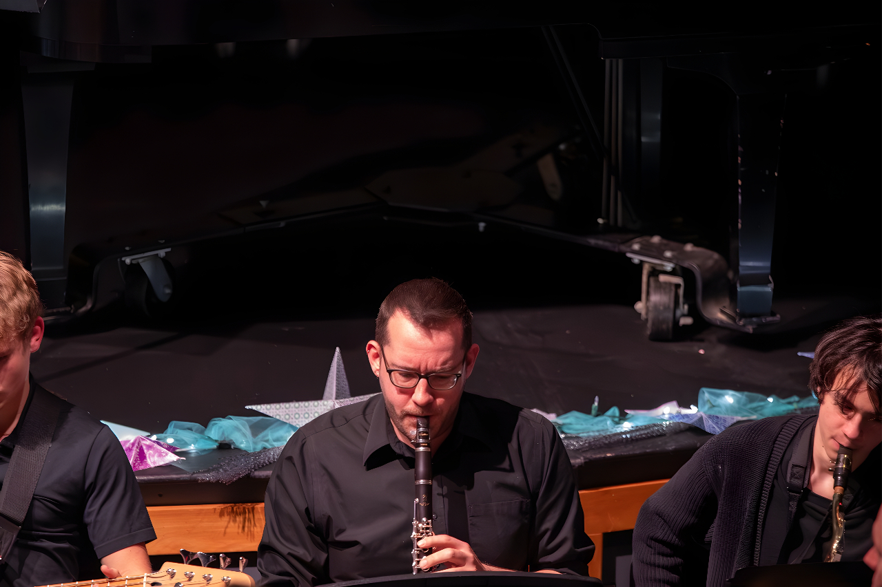 An hour of music community spirit filled the packed theater Thursday evening as students from across divisions showcased their talents at the annual Winter Concert.