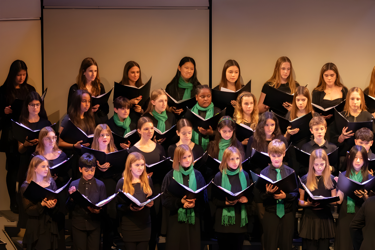 An hour of music community spirit filled the packed theater Thursday evening as students from across divisions showcased their talents at the annual Winter Concert.