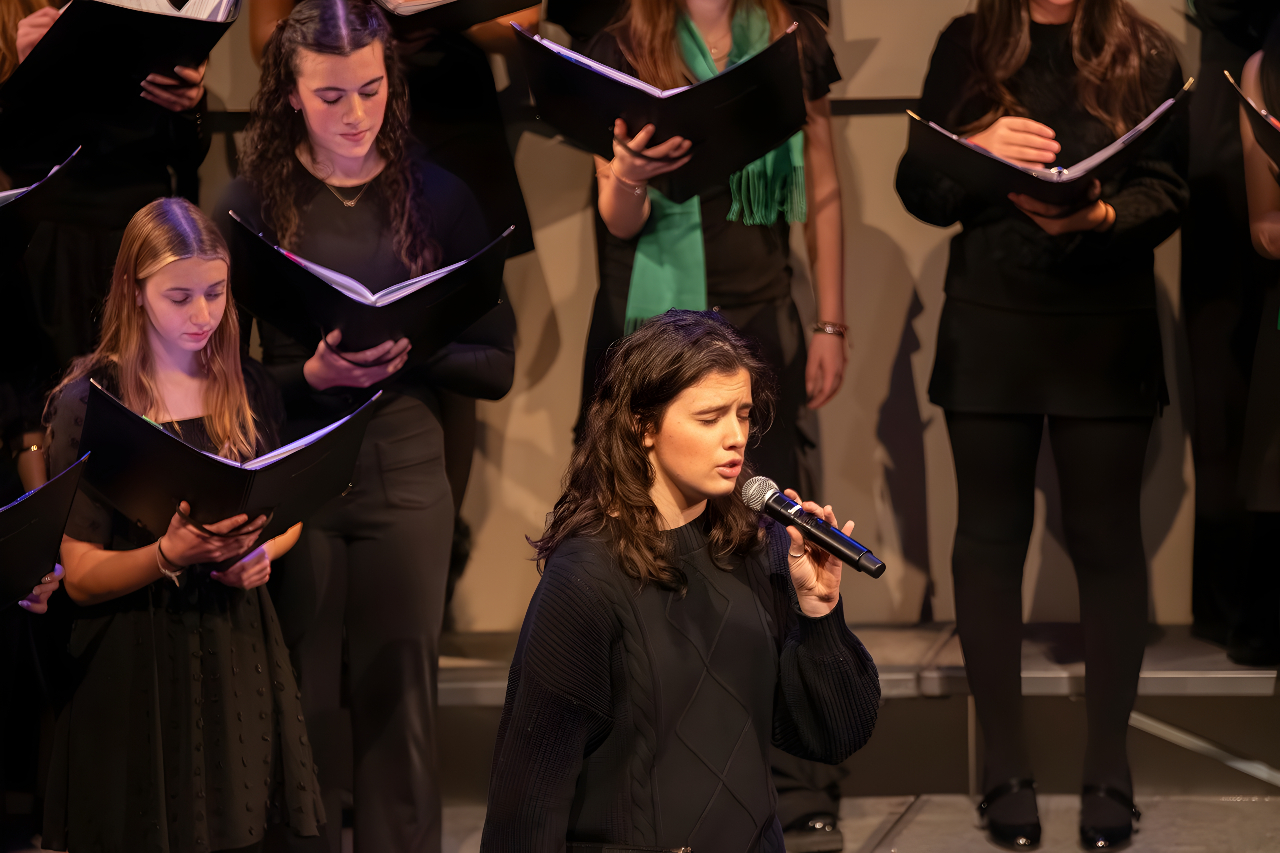 An hour of music community spirit filled the packed theater Thursday evening as students from across divisions showcased their talents at the annual Winter Concert.