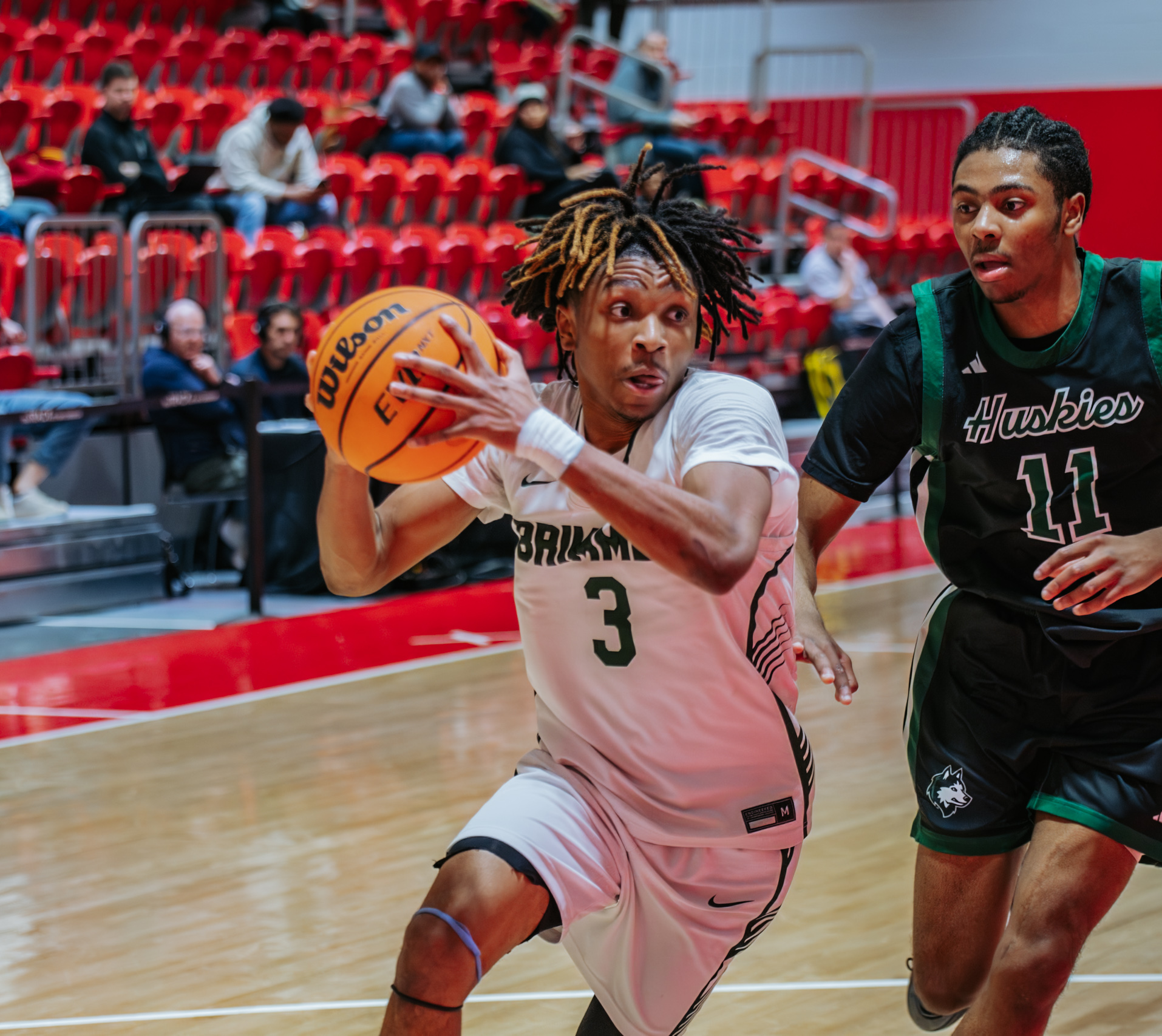 Windston Leguntus ’26 drives to the basket for an a layup.